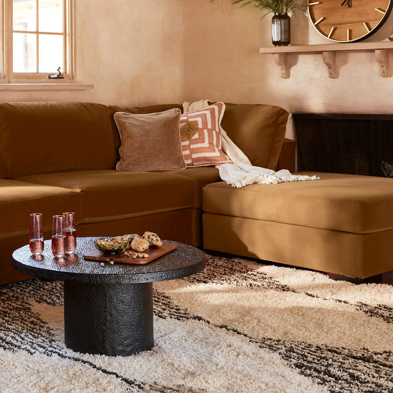 image of warm toned light brown sectional sofa