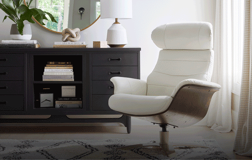 White swiveling chair with a brown wooden shell in motion on a beige rug beside a black credenza